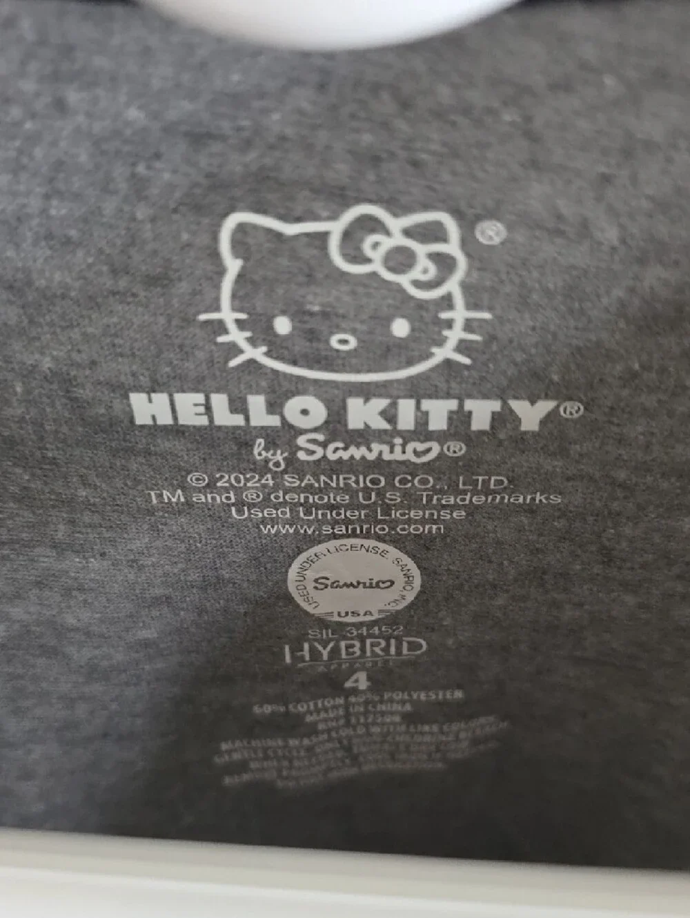 torrid Gray Hello Kitty Short Sleeve Tee with Pink Bow and Black Trim - Picture 2 of 4